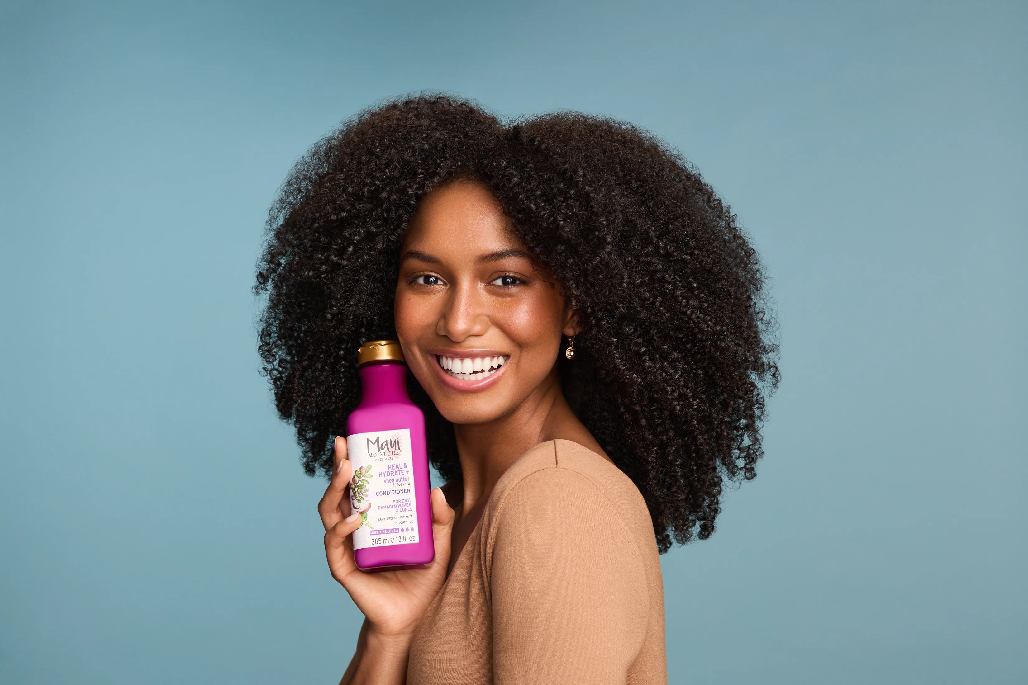 Maui Moisture curly hair model